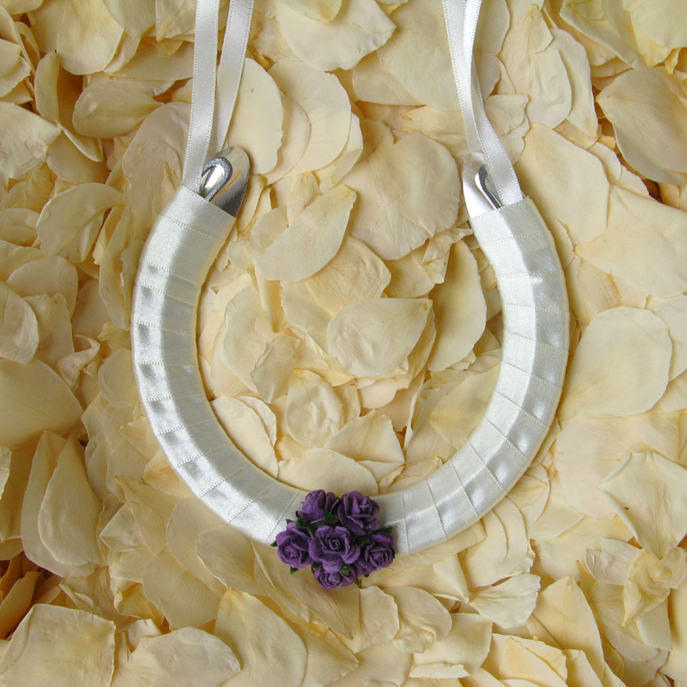 wedding horseshoe purples roses