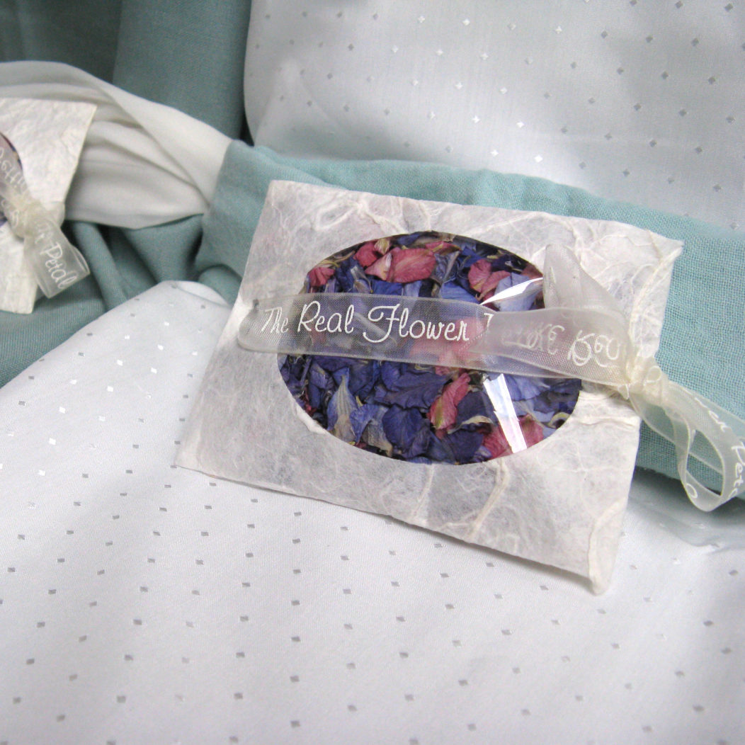 Leaving confetti on the seats in your ceremony venue is an easy way to get it to your guests
