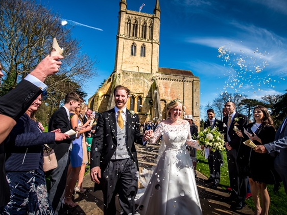 Confetti Moment – guests line the pathway outside the abbey Confetti Moment - guests line the pathway outside the abbey