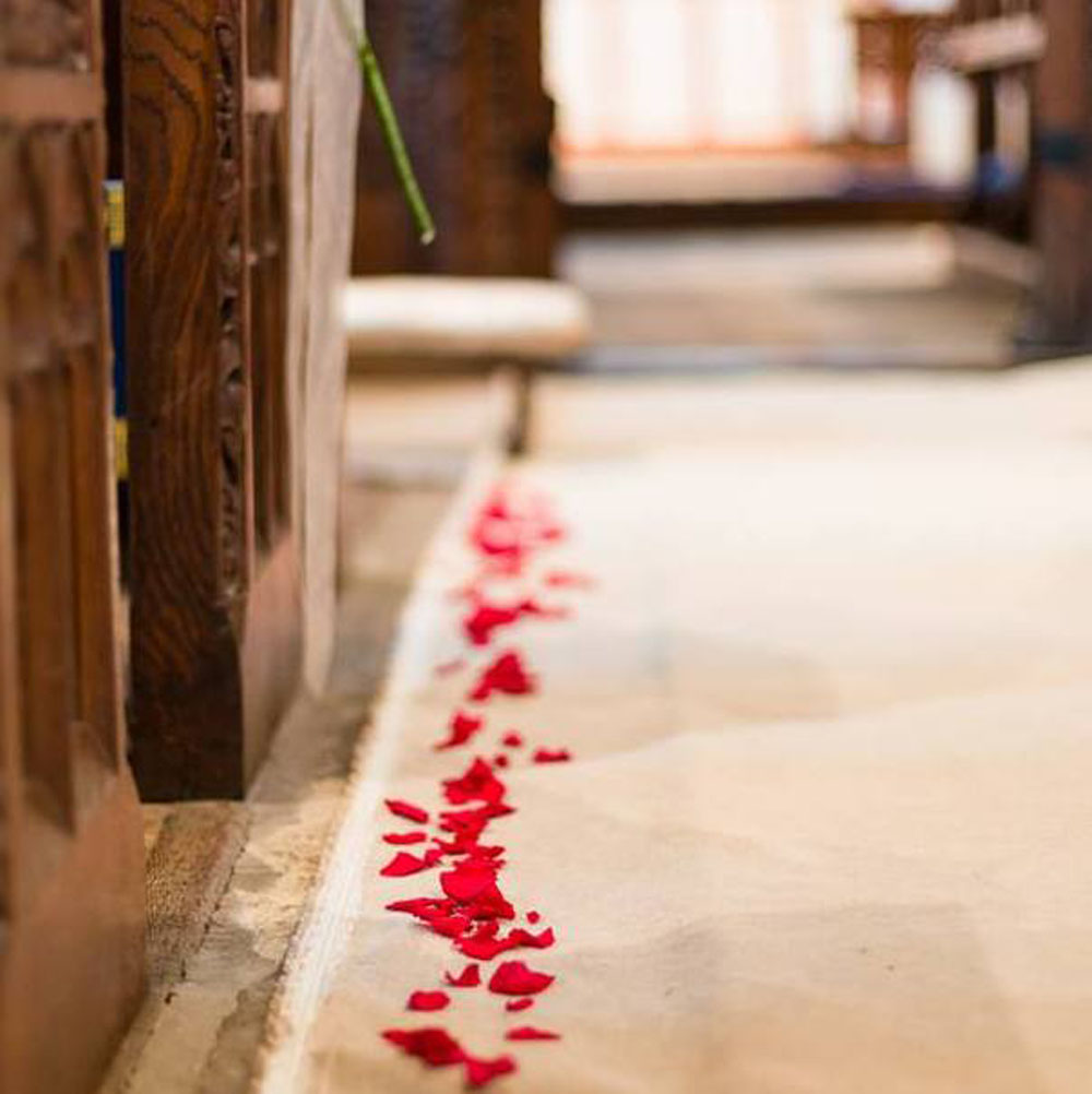 Flower girl baskets – a line of red rose petals down the aisle Flower girl baskets - a line of red rose petals down the aisle