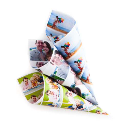 Three different wedding confetti photo cones. Each has a photograph printed on it in a repeating design.