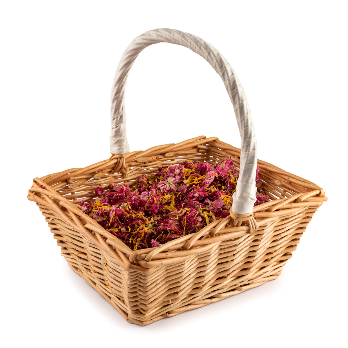 A rectangular basket with a cream ribbon covered handle, full of dark red and yellow real flower petal confetti.