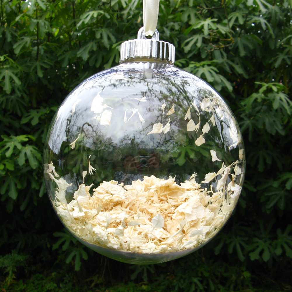 A Large Snow Bauble - filled with white delphinium and wildflower petal confetti