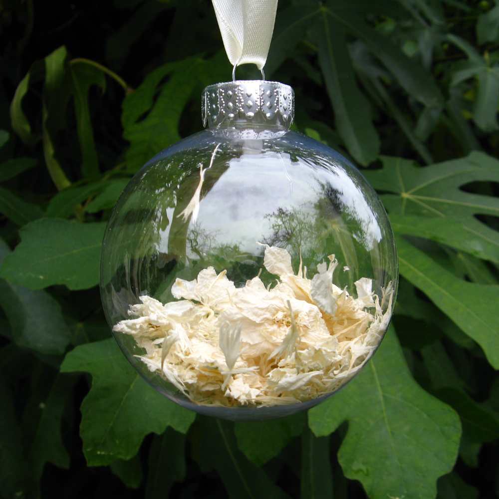 A Small Snow Bauble - filled with white delphinium and wildflower petal confetti